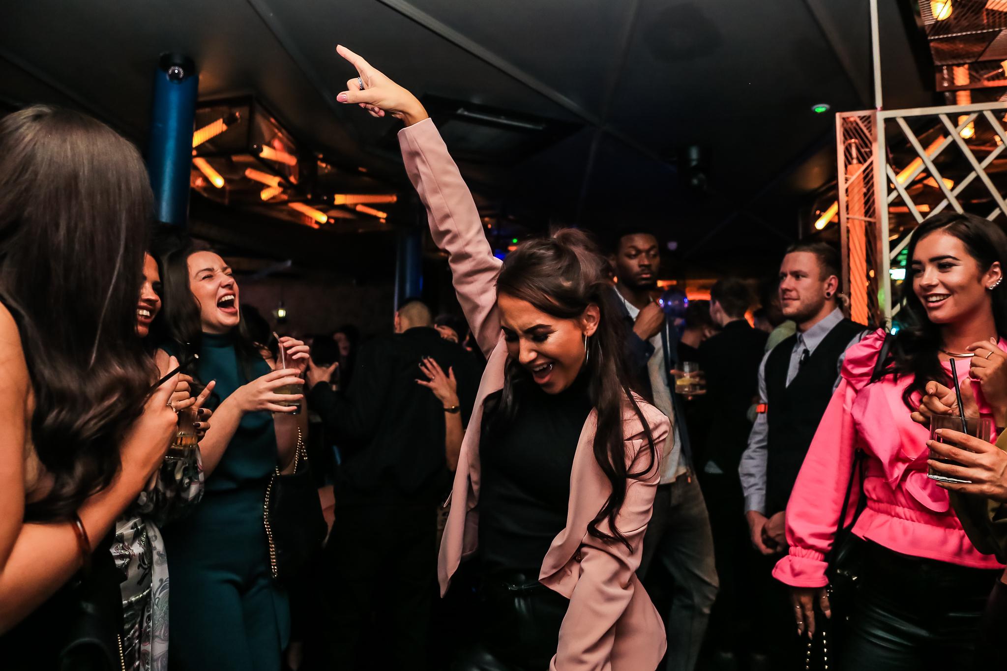 Women dancing in Dirty Martini